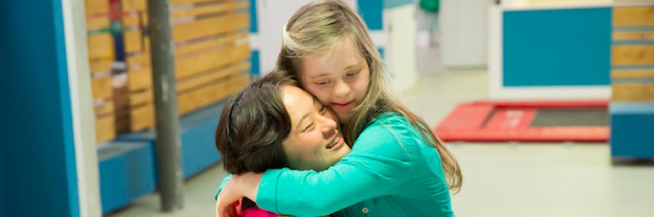 Born This Way Reality Show Will Star People With Down Syndrome two women hugging on born this way