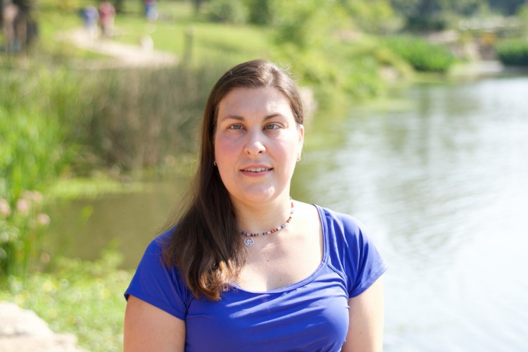 Natasha in a park outdoors near water