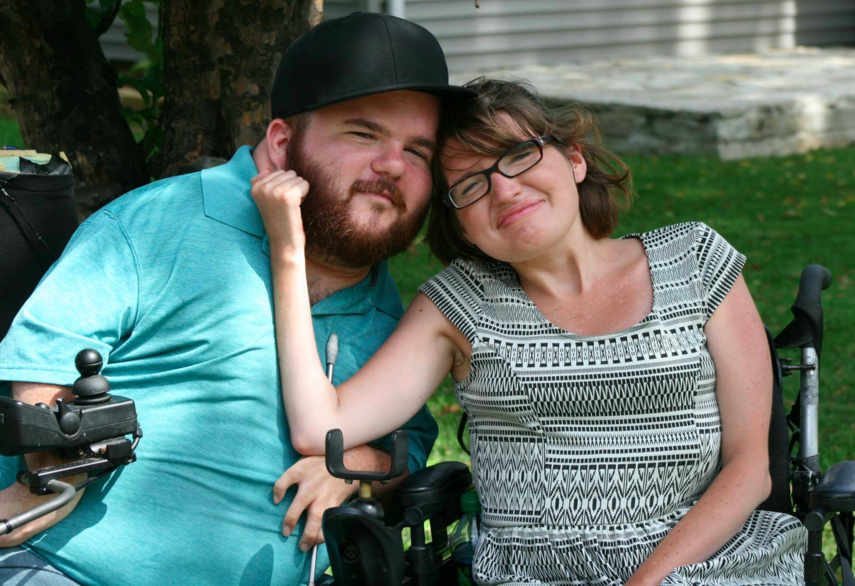 woman and man in wheelchairs