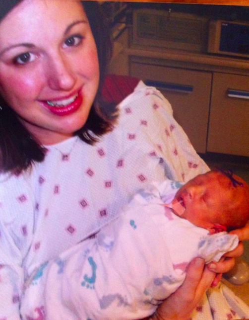 Cindy and her newborn daughter in the hospital