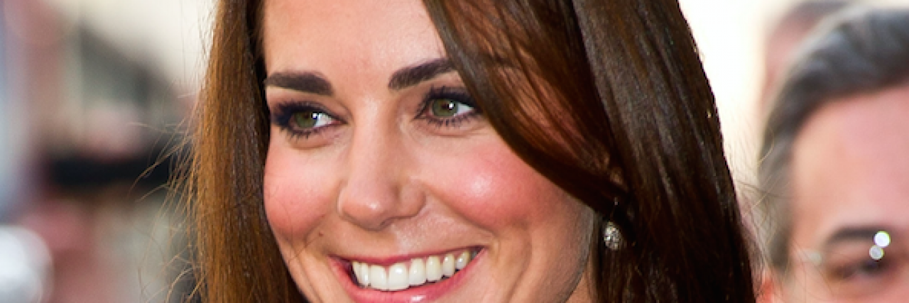 A close up photo of a Kate Middleton smiling