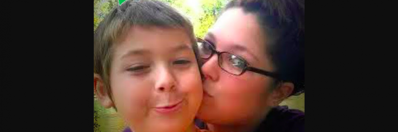 When Someone Asked, 'Do You Wish You Never Had Him?' Mother giving her young son a kiss on the cheek