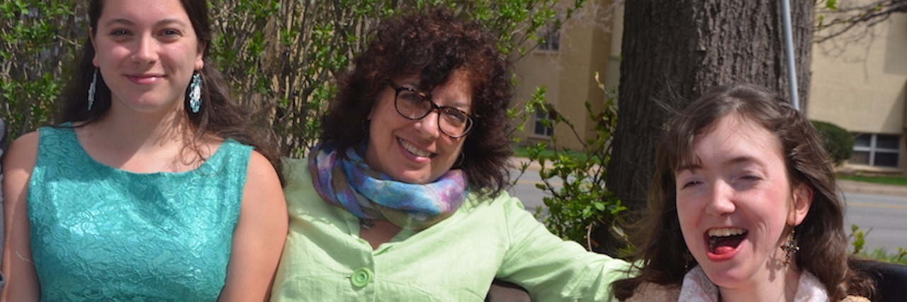 What Parents Should Know About Being a Special Needs Sibling Siena sitting next to her mother and older sister