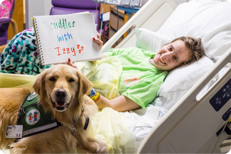 Megan spent 150 days in the hospital but found a new friend in Izzy the therapy dog.