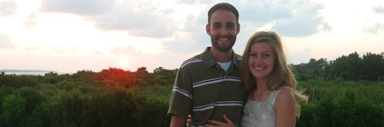 What It's Like to Have a Miscarriage man and woman posing in front of sunset