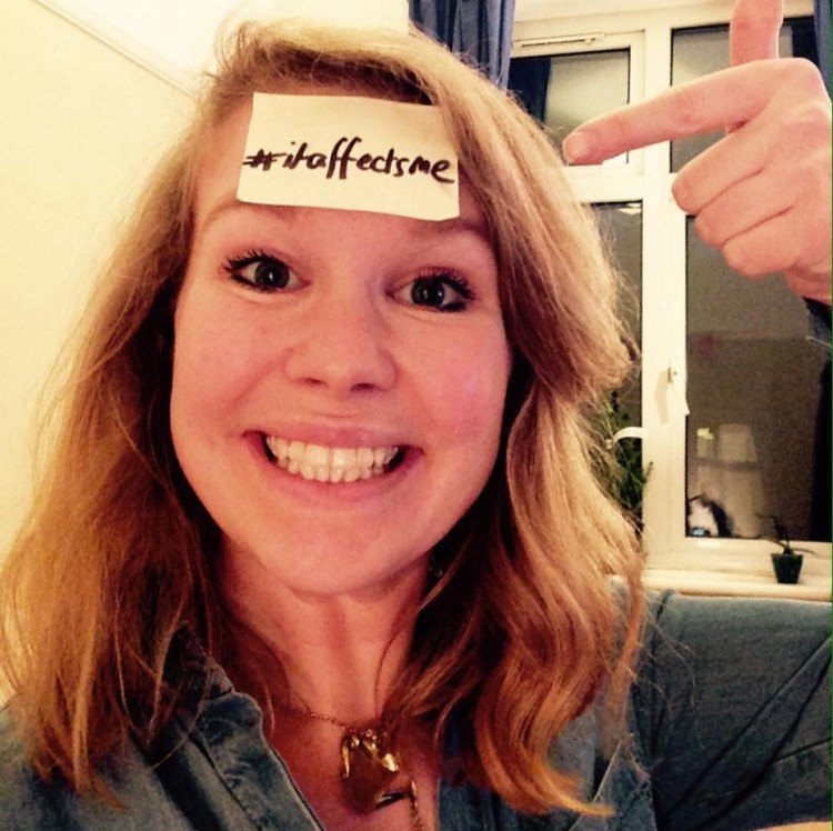 Laura Darrall poses with a Post-It on her forehead