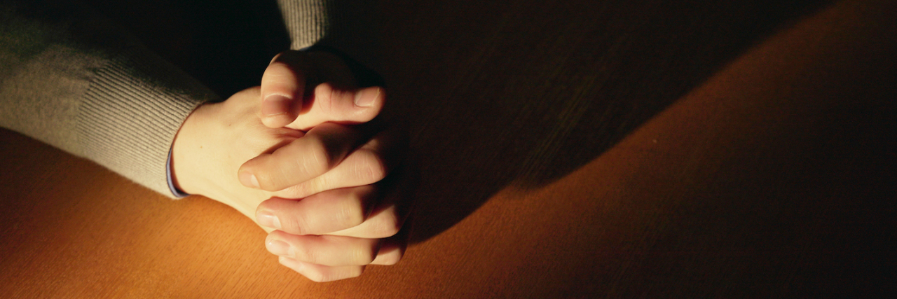 To the Person Who Tried to Pray My Disability Away hands closed in prayer