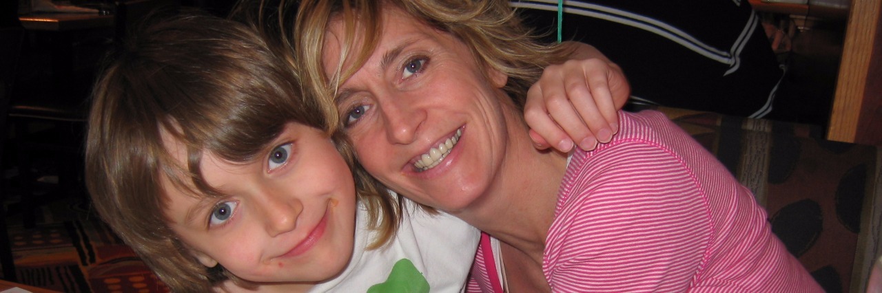 10 Lessons in 10 Years From My Son on the Autism Spectrum mom and son at dinner table