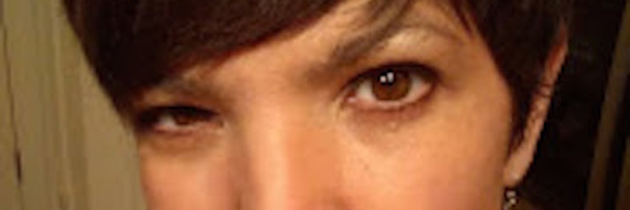 When You Are New to Life With a Disability An upclose profile photo of a girl with short hair and bangs