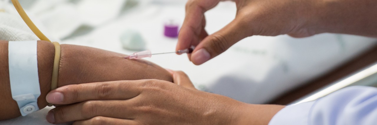 Getting a Hypothyroidism Diagnosis Despite My Numbers and Doctors Nurse do phlebotomy from patient in hospital