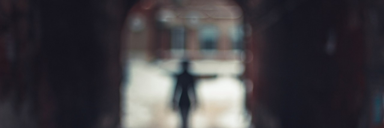 The Misunderstood Grief of a Person Whose Spouse Died by Suicide Blurred silhouette