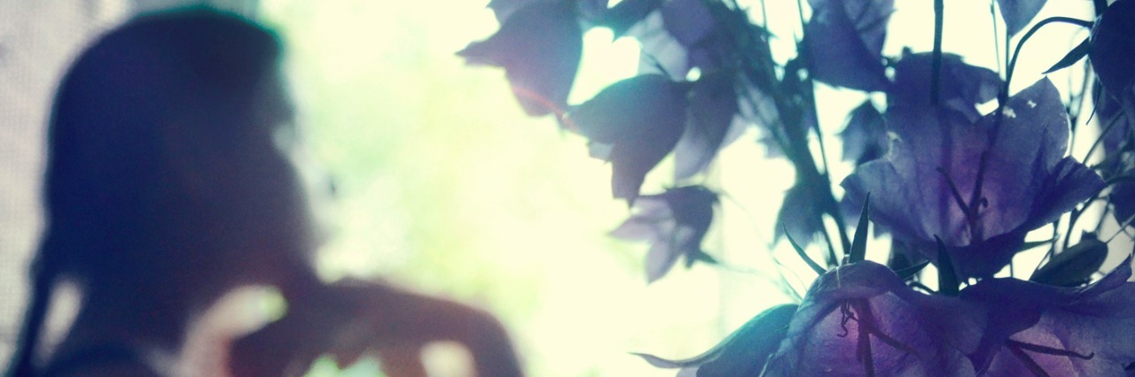 Finding My Purpose in the New Year in the Face of Bipolar Disorder Girl staring at the window