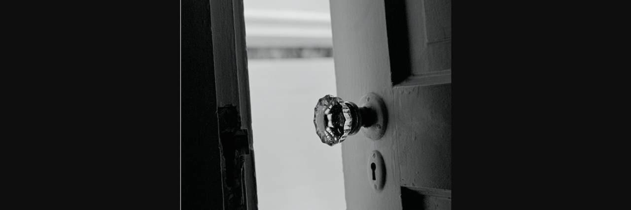 Why I've Decided to Come Out of the 'Bipolar Closet' Black and white photo of door slightly open, with focus on door handle