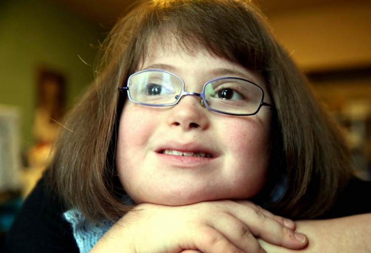 Dani Taraba, 9, models the Specs4us Erin's World Frame glass line, designed by Maria Dellapina. 