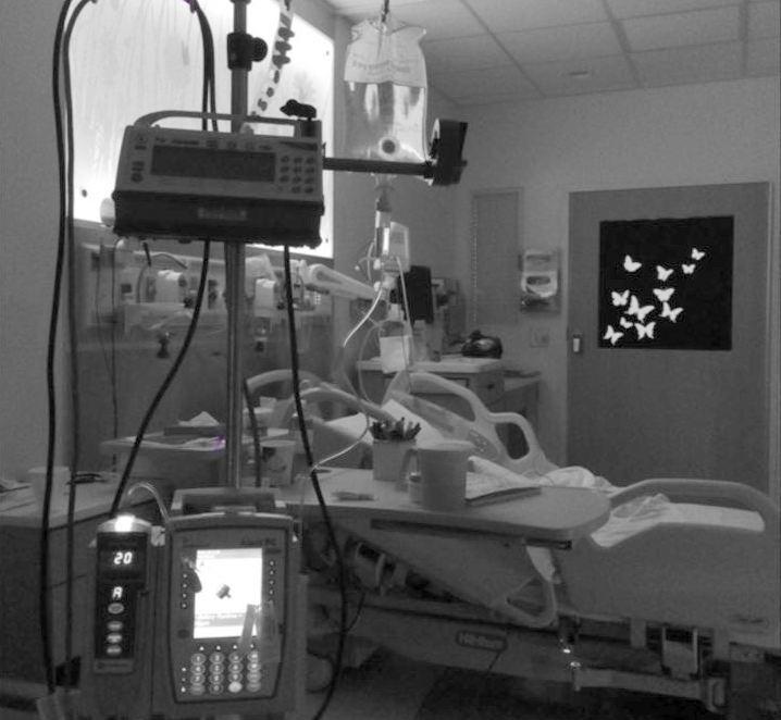 Hospital room with bed and machines