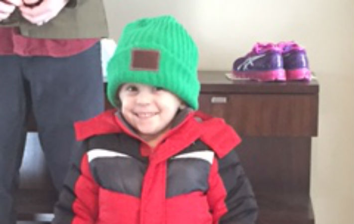 boy in hat and winter jacket