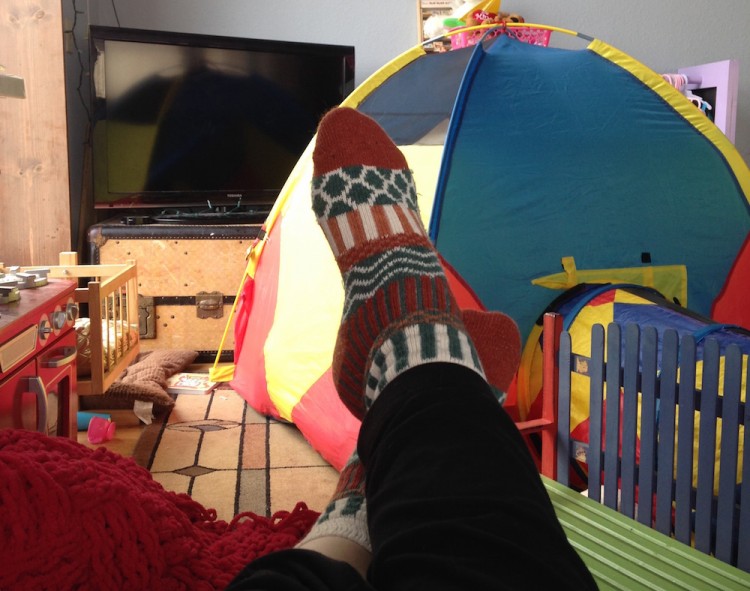 feet up in play room with tv