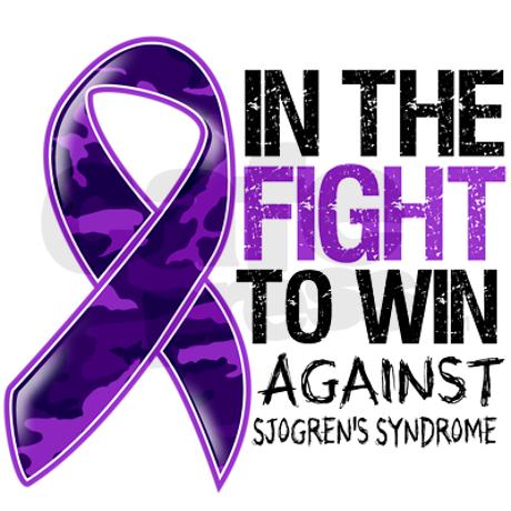 purple ribbon with the text "in the fight to win against Sjogren's syndrome"