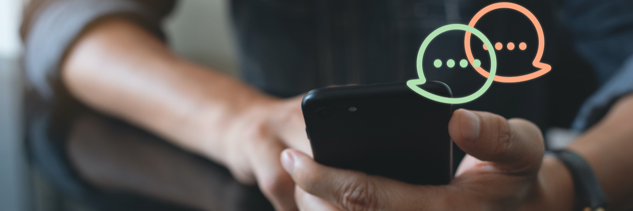 Texts to Send Someone With Depression Close up of person's hands holding phone with chat bubbles illustrated above screen.