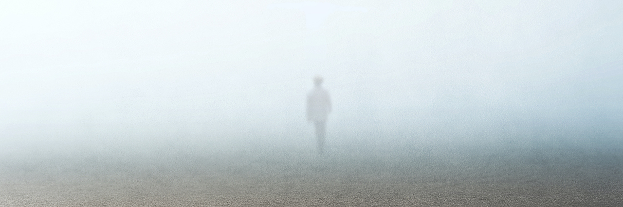 12 People Describe What It's Like to Live With Chronic Pain Person standing in fog