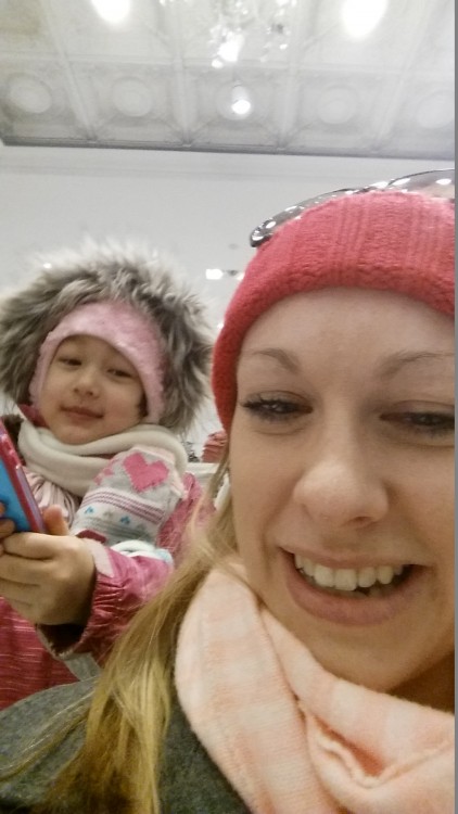 Woman in Pink Hat and Baby