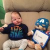 baby next to teddy bear holding "6 months" sign