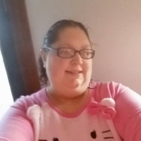 selfie of author wearing a pink hello kitty shirt