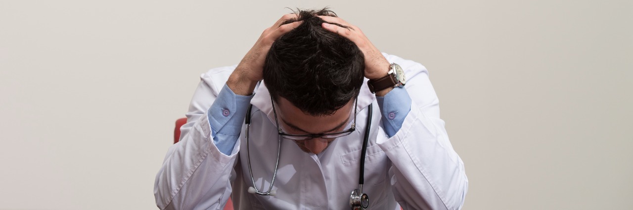 7 Questions I Ask Myself Before I Blame My Doctor Desperate Doctor Holding Hands On His Head