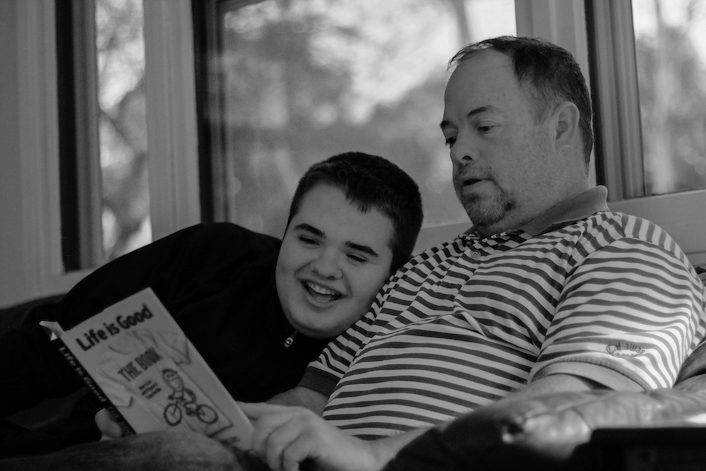 Tucker and his dad, Dennis actively practice the 10 Superpowers of Optimism_photo courtesy of Michelle Delzer Photographer