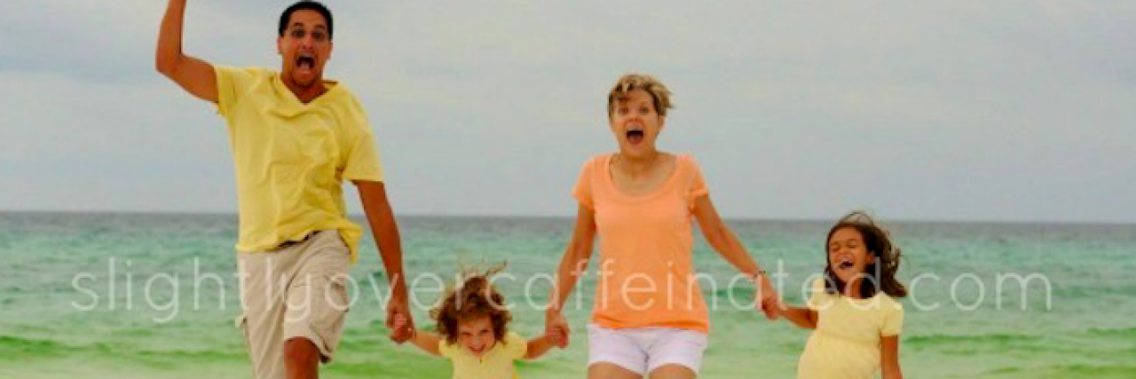 When My Daughter Asked If She’d Have to Get Scars Like Mine Family jumping on the beach