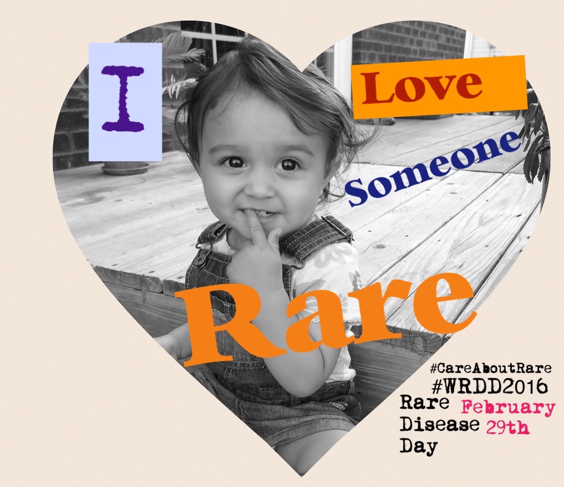 A photo of Michelle's daughter with a heart around it and the words "I love someone rare"