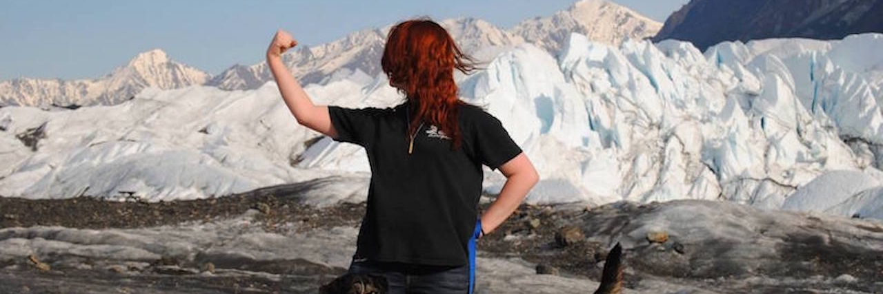 Telling People With Chronic Illness to ‘Just Think Positively’ woman in front of glacier