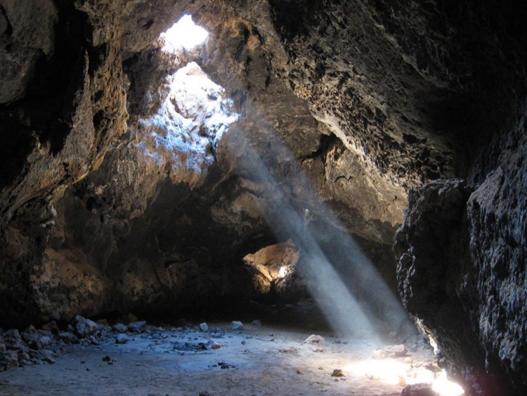 light shining through the darkness of the cave