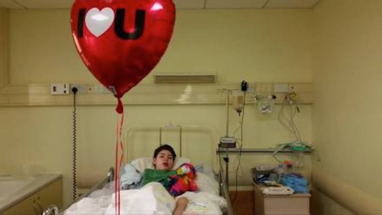 boy in hospital bed