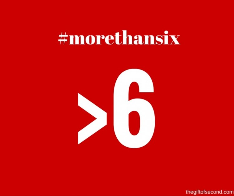 #morethan6 written in white font, with a red background.
