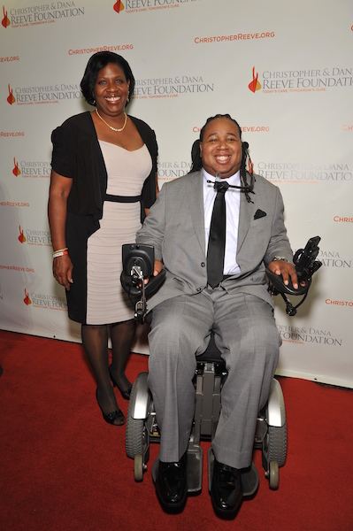 woman and son in wheelchair on the red carpet