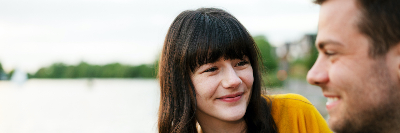 How to Be Married and Chronically Ill Woman looking at man, smiling