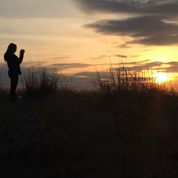 Taking a photo at sunset