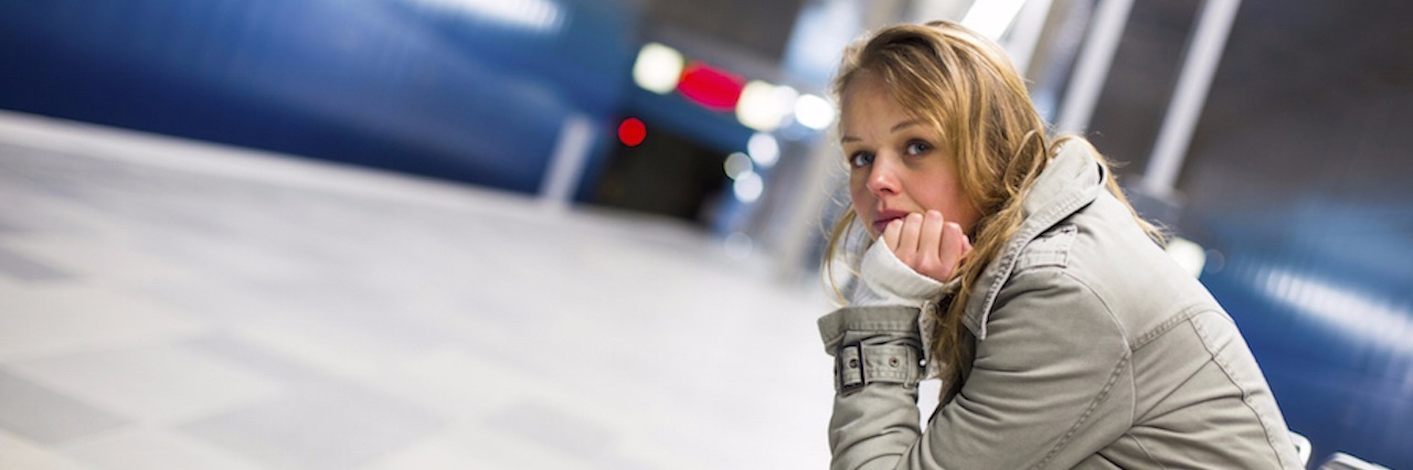The Question About Suicide I Wish People Would Ask young woman sitting in metro station