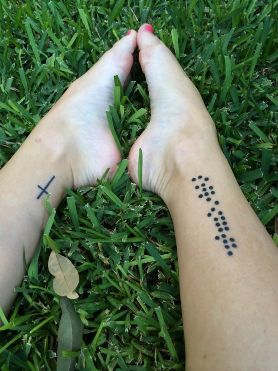 braille tattoo on woman's leg