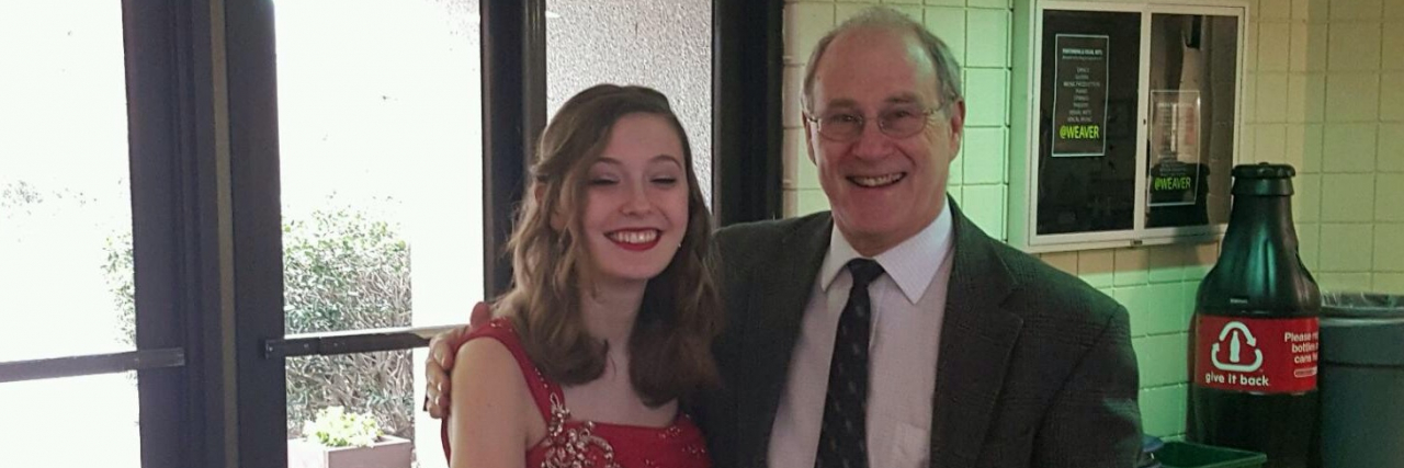 To My 7-Year-Old Self When the Doctor Said ‘Epilepsy’ Man in suit with posing with young woman