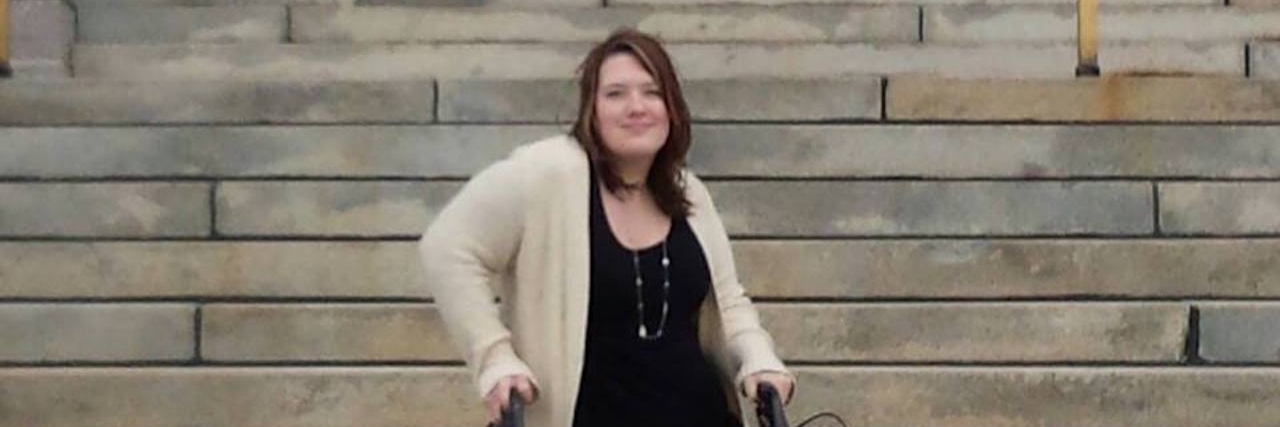 Disability, Beauty and Self-Acceptance author standing in front of capitol
