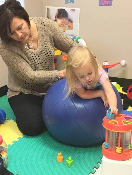 Ali Cummins's daughter during a therapy session.