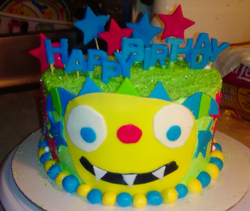 cake decorated to look like henry hugglemonster cartoon