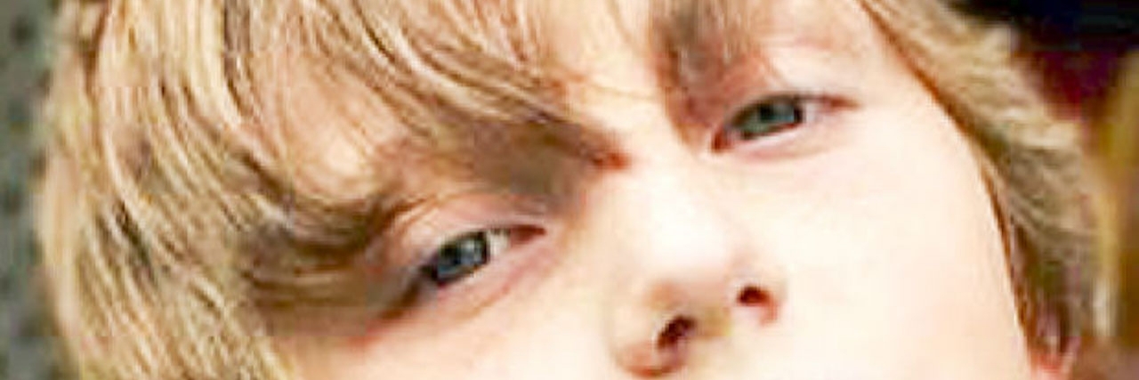 Losing a Patient Through Suicide: A Therapist's Experience Close up photo of a young boy with blonde hair