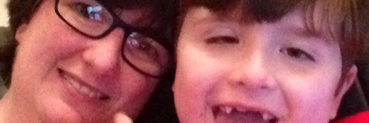 6 Things You May Not Know About My Child With Developmental Delay woman and her son with autism