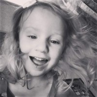 daughter smiling, black and white photo