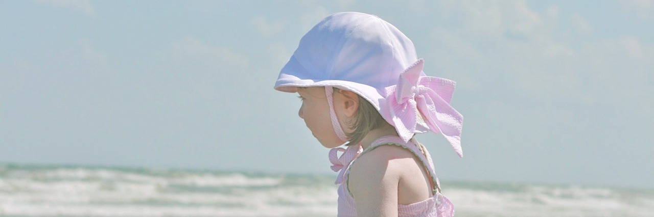 Tips for Parents Feeling the Shock of a Rare Disease Diagnosis girl standing on beach