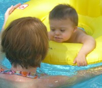 baby in tube in pool
