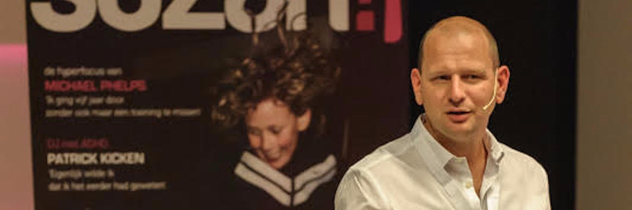 Getting Diagnosed With ADHD as an Adult author giving presentation at work